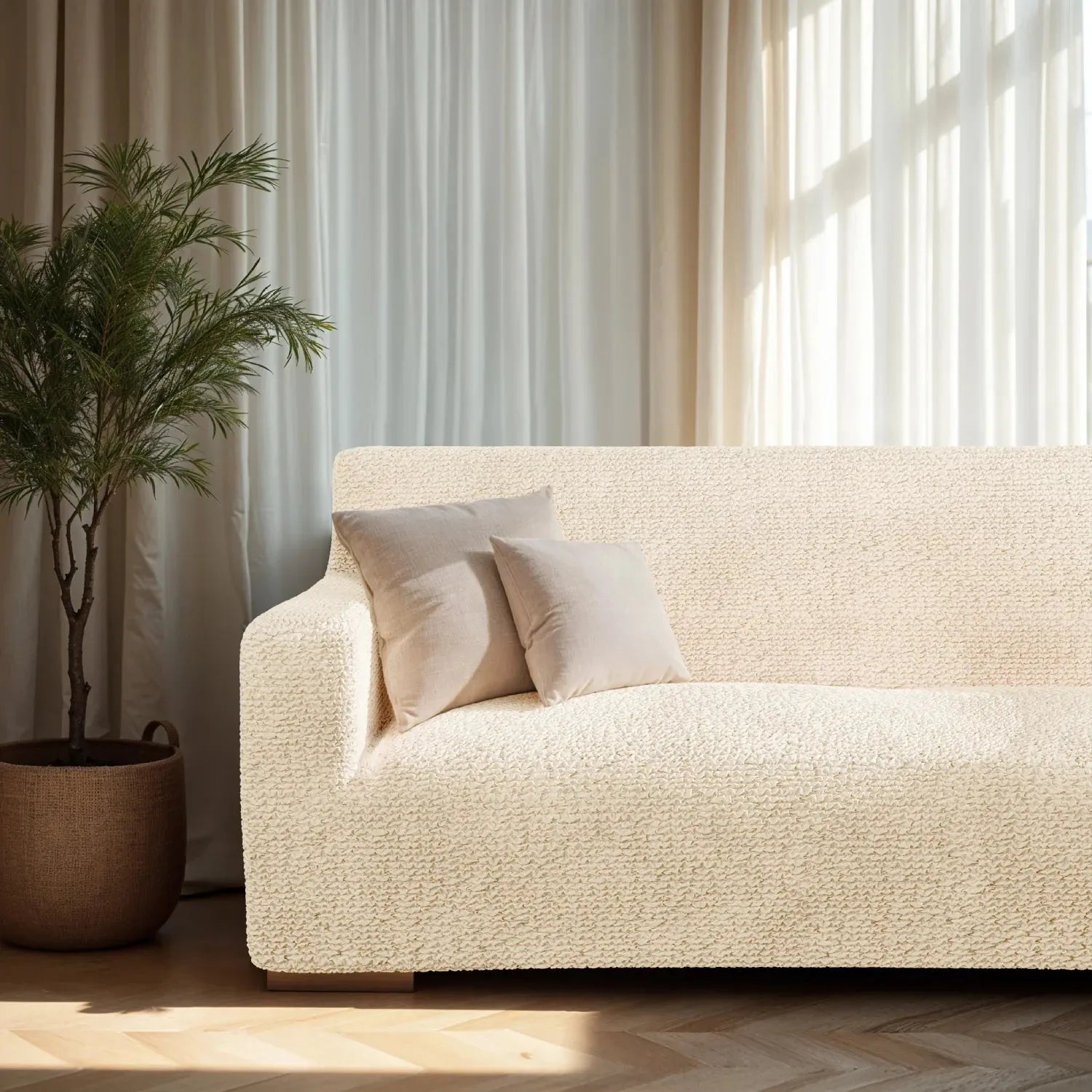 Plume Bubble cream couch cover adding warmth to neutral home decor