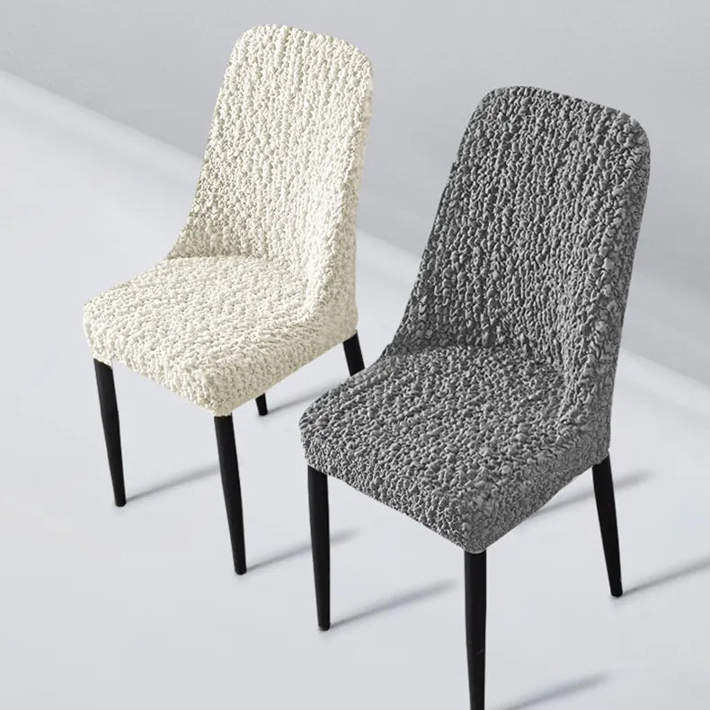 Custom curved dining chair covers handmade by Plume Bubble – stretch, breathable, and cat-proof fabric for all-season protection.