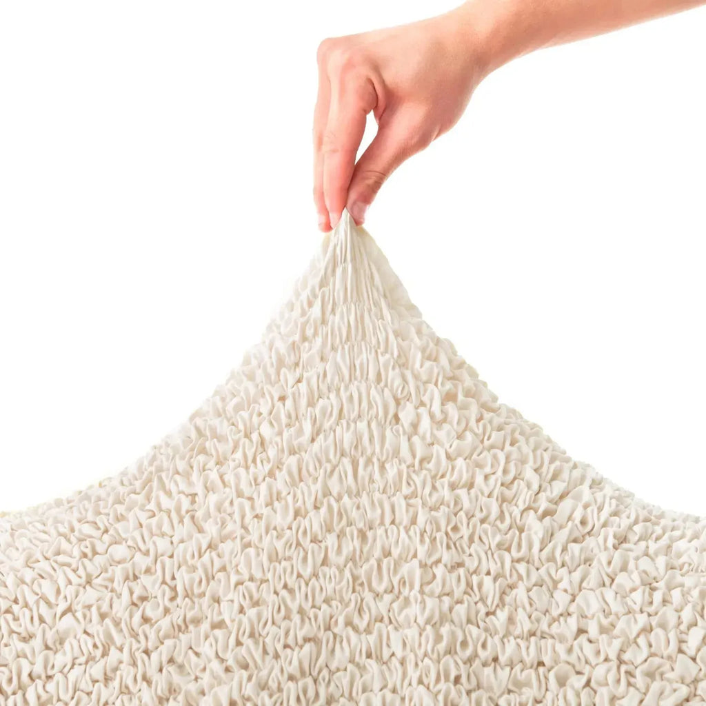 Family- and pet-friendly cream slipcover by Plume Bubble made from soft polyester