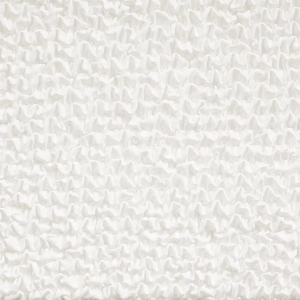 Close-up of Plume Bubble white slipcover fabric showing breathable, smooth surface