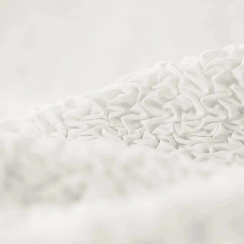 Hypoallergenic white slipcover from Plume Bubble, ideal for sensitive skin and pets